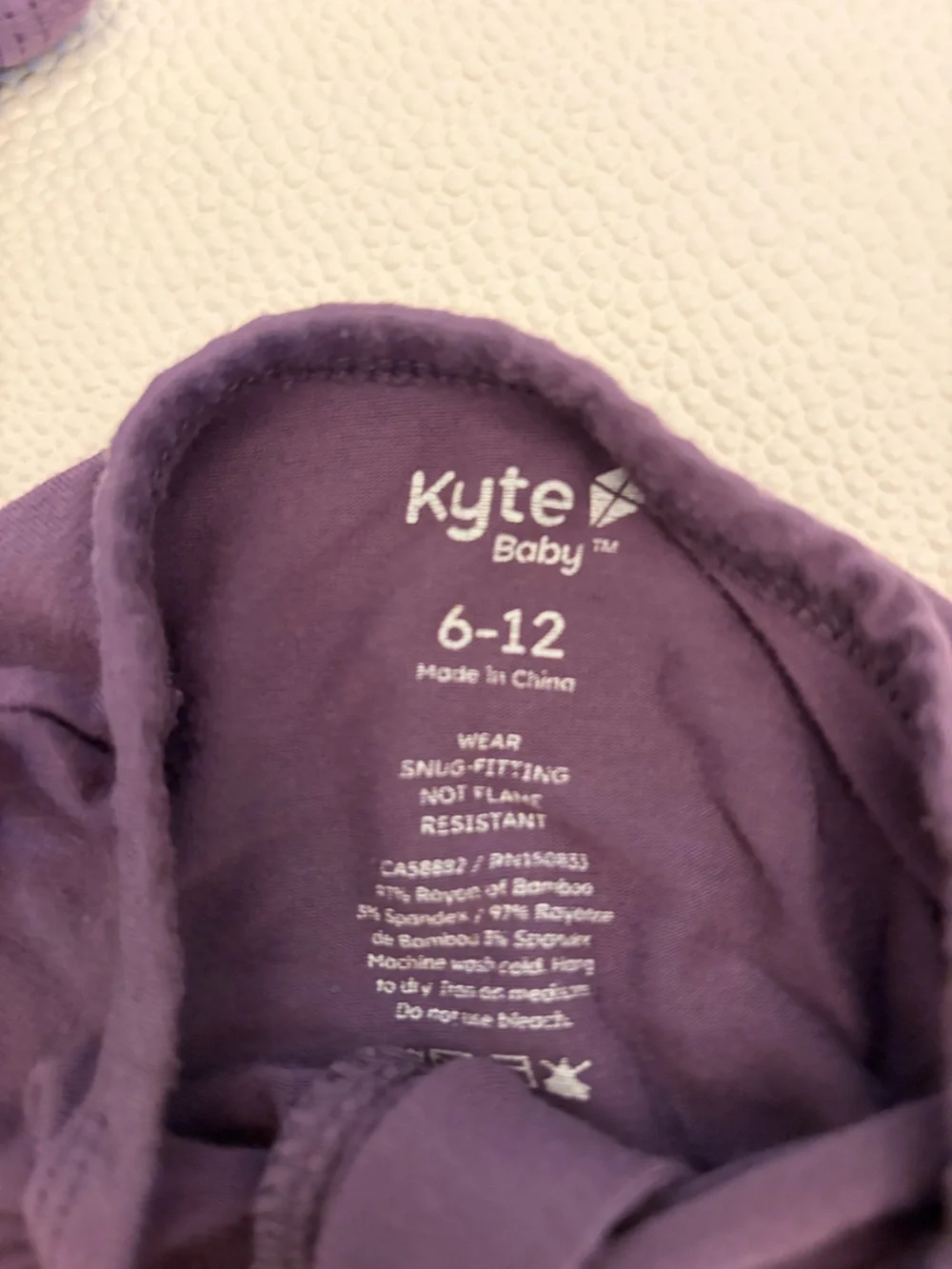Kyte Baby Footie Zipper Pajamas TRIO. Purple, Peach Print, Yellow. 6-12mo